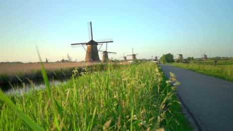 Dutch-windmills-in-famous-Netherlands-countryside-landscape-Kinderdijk-fixed