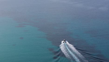 Speedboat-while-traveling-in-the-beautiful-Aegean-Sea-on-the-crystal-clear-blue-sea