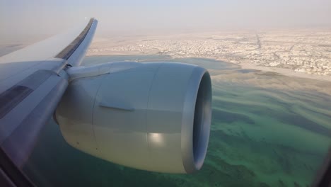 Qatar-airways-flying-over-Doha
