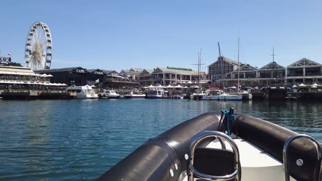 POV-slomo-shot-of-RIB-boat-entering-port-in-Cape-Town,-South-Africa