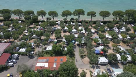 Aerial-Fly-Over-of-Camping-Serenella-and-Lake-Garda,-Italy