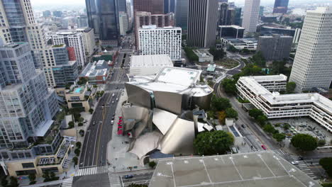 Walt-Disney-Concert-Hall,-Los-Angeles-CA-USA,-Aerial-View-of-Landmark-Building-and-Traffic-on-Grand-Avenue-and-Hope-Street
