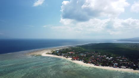 Aerial-view-coast-tropical-village-seaweed-farm-on-water