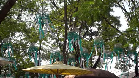 Stunning-scenery-at-Thai-market-with-lanterns-and-umbrellas