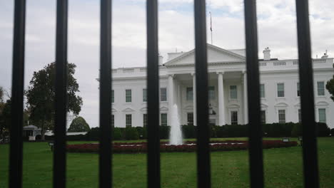 A-Slow-Motion-Shot-of-the-White-House-with-the-Fence-in-the-Foreground