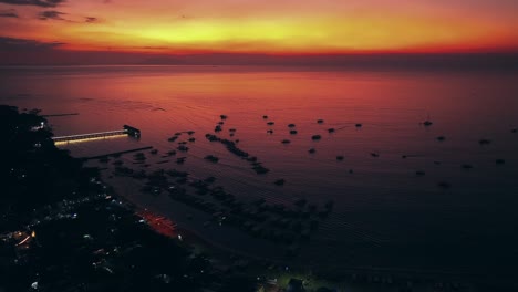 Epic-Drone-shot-of-golden-hour-with-parking-boats-at-bay