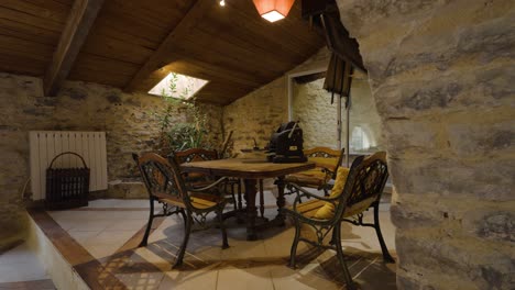 Wide-interior-shot-of-luxury-dining-room-inside-traditional-renovated-countryside-house-in-France
