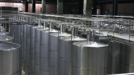 Modern-winery-with-stainless-steel-fermentation-tanks-in-high-tech-winemaking-facility