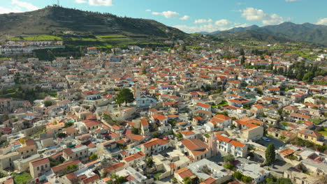 Overlooking-the-expansive-view-of-Lefkara,-the-essence-of-the-village-with-its-iconic-orange-roofs,-nestled-among-the-Cyprus-mountains,-reflecting-a-perfect-blend-of-nature-and-culture