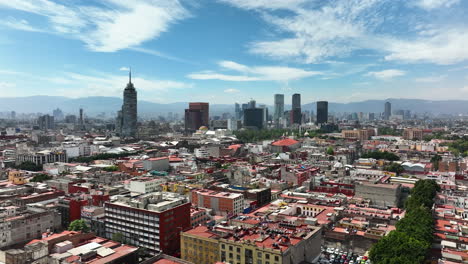 Panoramic-drone-shot-circling-the-CDMX-Historic-center,-sunny-day-in-Mexico-city