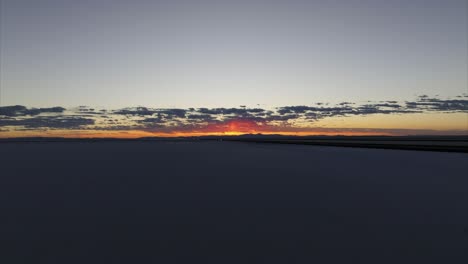Aerial-drone-view-of-Salt-Flats-landscape-at-sunset,-Bonneville-in-Utah