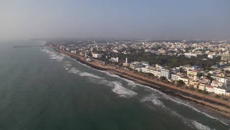 Aerial-footage-of-the-Puducherry-shoreline-featuring-a-dramatic-Bay-of-Bengal-vista