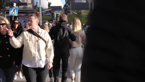 Timelapse-of-people,-cars-and-bikes-moving-on-street-in-Stockholm
