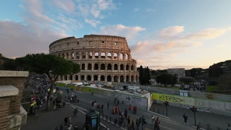 Timelapse-of-Colosseum-area-and-its-metro-construction-site-during-sunset,-location-in-Rome,-Capital-of-Italy