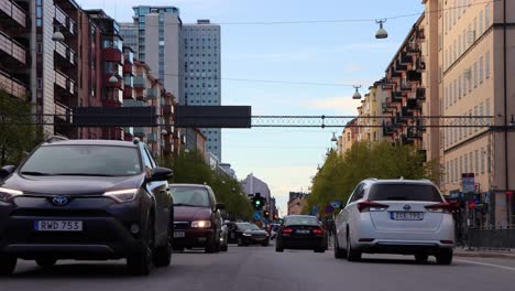 Static-view-of-street-traffic-on-Gotgatan-in-Stockholm,-spring-2020