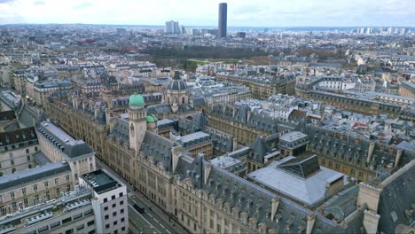 Sorbonne-University-with-Montparnasse-tower-in-background,-Paris-cityscape,-France