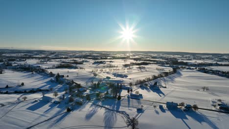 Snowy-winter-landscape-in-countryside-of-America-with-snow-covered-fields