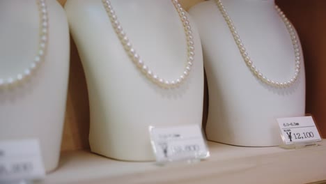 Beautiful-Japanese-Pearl-Necklaces-on-Display-4k
