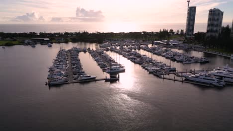 Right-to-Left-aerial-views-over-the-Marina-on-the-Broadwater-on-the-Gold-Coast,-Australia