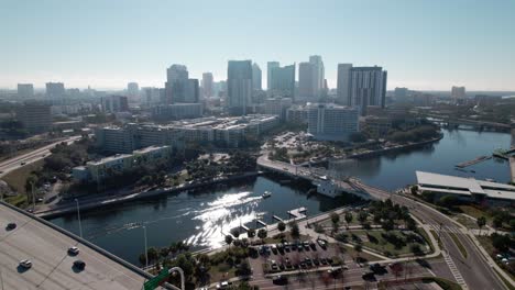 Drone-flying-into-downtown-Tampa-bay-riverwalk-area