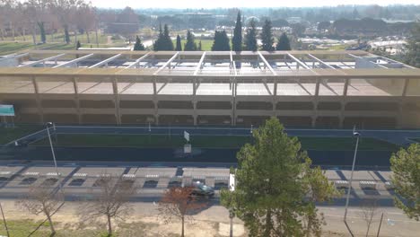 Aerial-of-parking-Relais-Saint-Chamand,-providing-commuters-with-a-hassle-free-parking-solution-in-Avignon,-France