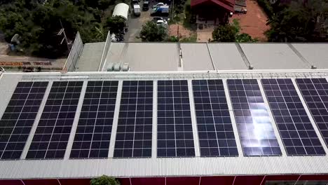 4k-Aerial-of-Warehouse-Solar-Rooftop,-Drone