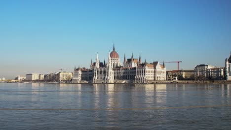 Budapest-city-center-view-with-Parliament-building-and-Danube-river-on-a-sunny-day,-gothic-architecture,-wide-distant-panoramic-shot