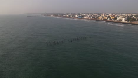 Aerial-video-of-the-entire-Puducherry-city-and-its-coastline,-which-includes-a-striking-view-of-the-Bay-of-Bengal