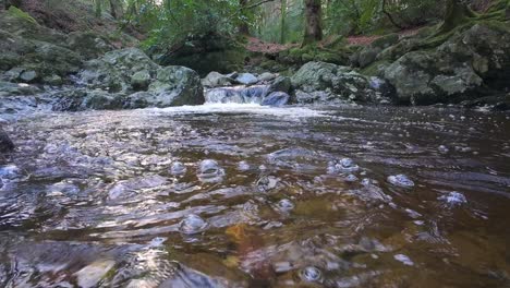 mountain-stream-cascade-in-pool-and-bubbles-floating-by-Mahon-River-Comeragh-Mountains-Waterford-Ireland