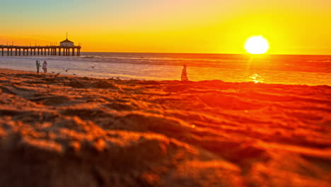 Sunset-Over-Manhattan-Beach-in-Los-Angeles-with-Pier-from-a-Low-Angle-Time-Lapse