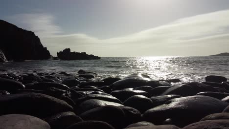 Calm-Waves-Rolling-onto-Pebble-Beach-on-Sunny-Day-4K