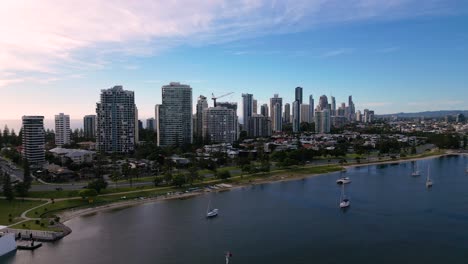 Reversing-aerial-views-over-the-Broadwater-and-marina-on-the-Gold-Coast,-Australia