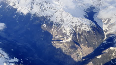 Aerial-view-of-the-Swiss-Alps-covered-with-snow