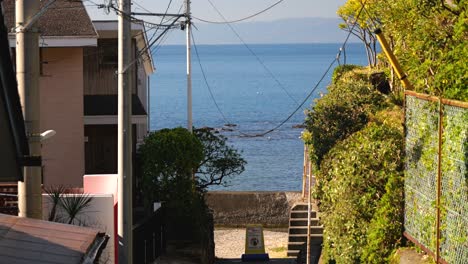 Typical-Japanese-surfer-town-with-small-road-leading-to-ocean