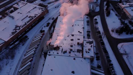 A-revealing-shot-of-the-manufacturing-plant-in-winter