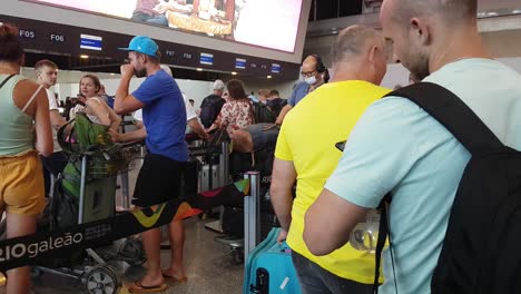 Passengers-in-Rio-De-Janeiro-International-Airport-Waiting-in-Line-For-One-of-Last-Flights-to-Europe-During-Coronavirus-Pandemic-Outbreak
