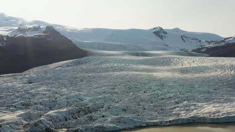 Flying-over-Fjalljokull-glacier-in-Vatnajokull-National-Park,-South-Iceland