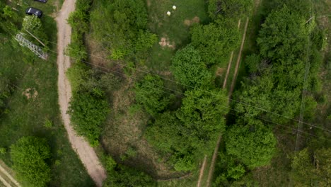 Overhead-drone-shot-retreating-above-the-village-of-Tsarichina-Hole-in-a-remote-countryside-in-Bulgaria