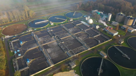 Aerial-view-orbiting-waste-water-sewage-treatment-plant-sewerage-aeriation-processing-channels