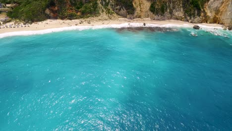 Petani-beach-in-kefalonia,-greece-with-turquoise-waters-and-white-sands,-aerial-view