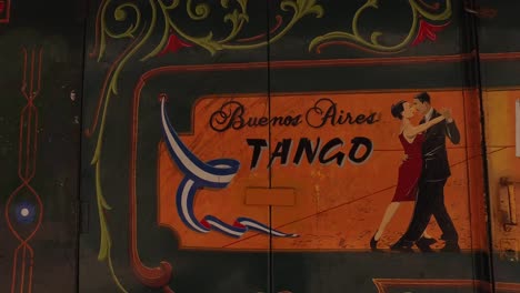 Buenos-Aires-Argentina,-Tango-Dance-School-Sign-and-Artwork-on-Door-of-Building