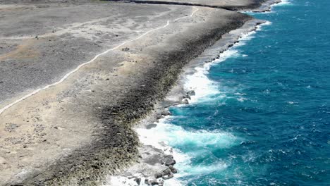 Shete-boka-national-park-coast,-curacao,-with-strong-waves-crashing,-aerial-view