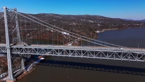 An-aerial-view-of-the-Bear-Mountain-Bridge-on-a-sunny-day-with-clear-blue-skies