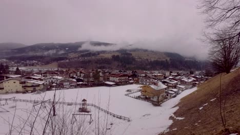 Beautiful-village-of-Kirchberg-in-winter-season,-time-lapse-panoramic-view