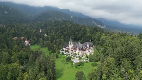 Sinaia-Peles-Castle,-a-Tourist-Attraction-in-the-Carpathians,-Romania---Aerial-4k