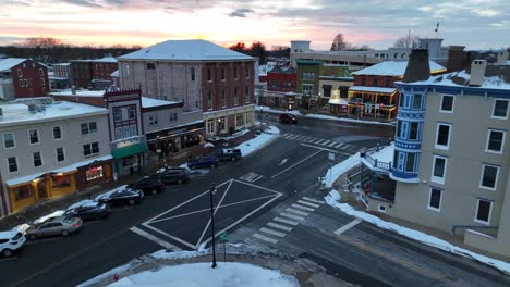 Aerial-descending-shot-onto-a-downtown-street-at-Christmas