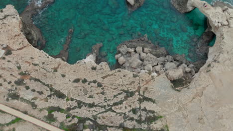 Bridge-of-Lovers-in-Ayia-Napa,-Cyprus,-aerial-downwards-view