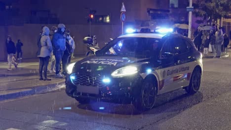 Barcelona-urban-guard-patrolling-with-motorcycles-on-a-rainy-day-in-the-streets-of-Barcelona