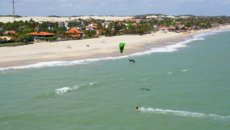 Aerial-view-of-people-practing-kite-surf,-Cumbuco,-Ceara,-Brazil