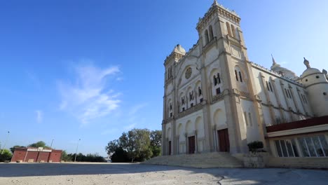 Cathedral-architecture-in-Carthage,-Tunis-under-a-clear-blue-sky,-static-shot-in-daylight